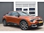 Citroën E-C4 Shine 50 kWh |SOH 94% | Navigatie | Apple Carplay & Android Auto | Camera | Parkeersensoren voor en achter | SOH 94% | Dodehoekdetectie | Head Up Display | Stoelverwarming | Lichtmetaal | Zeer Compleet!