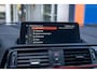 BMW 1-Serie 118i High Executive | Leder | Navi | Parkeersensoren | Stoelverwarming | Keyless | Cruise Control | Cruise control | Electronic climate controle | Keyless start