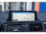 BMW 1-Serie 118i High Executive | Leder | Navi | Parkeersensoren | Stoelverwarming | Keyless | Cruise Control | Cruise control | Electronic climate controle | Keyless start