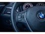 BMW 1-Serie 118i High Executive | Leder | Navi | Parkeersensoren | Stoelverwarming | Keyless | Cruise Control | Cruise control | Electronic climate controle | Keyless start