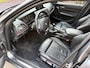 BMW 1-Serie 114i Business+ / SPORT / LEER / SCHUIFDAK / NAVI / STOELVERWARMING