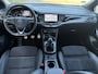 Opel Astra Sports Tourer 1.2 Ultimate 2e Eigenaar l Trekhaak l Camera l Carplay l Navi l Alcantara-Leder l 17''Lmv l Stoelverw-Stuurverw l Net beurt gehad l Dodehoek l Rijstrooksensor l Pdc V+A l 6 Bak l N.A.P l 146pk l Bj 11-2020 l Apk tot 08-2028