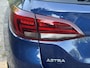 Opel Astra Sports Tourer 1.2 Ultimate 2e Eigenaar l Trekhaak l Camera l Carplay l Navi l Alcantara-Leder l 17''Lmv l Stoelverw-Stuurverw l Net beurt gehad l Dodehoek l Rijstrooksensor l Pdc V+A l 6 Bak l N.A.P l 146pk l Bj 11-2020 l Apk tot 08-2028
