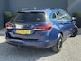 Opel Astra Sports Tourer 1.2 Ultimate 2e Eigenaar l Trekhaak l Camera l Carplay l Navi l Alcantara-Leder l 17''Lmv l Stoelverw-Stuurverw l Net beurt gehad l Dodehoek l Rijstrooksensor l Pdc V+A l 6 Bak l N.A.P l 146pk l Bj 11-2020 l Apk tot 08-2028