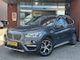 BMW X1 xDrive20i Executive // PANO / SCHUIF- KANTELDAK // NAVI // PDC V+A // CRUISE // TREKHAAK // ELEK. ACHTERKLEP //
