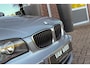 BMW 1-Serie 118i Executive | NL auto | 3e eigenaar | Achteruitrijcamera | Cruise control | Sportstuur | Climate control | Regensensor | Radio Professional | Lichtpakket | PDC | 16 inch
