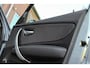 BMW 1-Serie 118i Executive | NL auto | 3e eigenaar | Achteruitrijcamera | Cruise control | Sportstuur | Climate control | Regensensor | Radio Professional | Lichtpakket | PDC | 16 inch