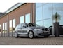 BMW 1-Serie 118i Executive | NL auto | 3e eigenaar | Achteruitrijcamera | Cruise control | Sportstuur | Climate control | Regensensor | Radio Professional | Lichtpakket | PDC | 16 inch