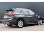 BMW X1 sDrive20i Centennial Executive 192pk Automaat | NL auto! | Trekhaak | Camera | Sportstoelen | Elektr. Achterklep