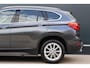 BMW X1 sDrive20i Centennial Executive 192pk Automaat | NL auto! | Trekhaak | Camera | Sportstoelen | Elektr. Achterklep