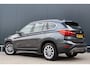 BMW X1 sDrive20i Centennial Executive 192pk Automaat | NL auto! | Trekhaak | Camera | Sportstoelen | Elektr. Achterklep