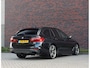 BMW 5-Serie Touring M550d xDrive | Pano - Trekhaak - HUD