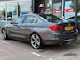 BMW 3-Serie 320i High Executive | Airco | Cruise | Navi | Leer