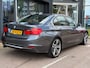 BMW 3-Serie 320i High Executive | Airco | Cruise | Navi | Leer