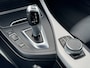 BMW 1-Serie 118i High Executive M-Sport Automaat | Navigatie Professional | DAB | Apple CarPlay | PDC Voor en achter | Stoelverwarming