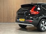 Volvo XC40 T4 Recharge Plus Bright | Trekhaak | Harman Kardon | All Season banden | Bestuurdersstoel elektrisch geheugen | Adaptieve Cruise Control | Stoel en Stuurwielverwarming | Parkeercamera | Pilot Assist | BLIS Dode Hoek Detectie | Parkeersensoren voor+achter | Passagiersstoel elektrisch | 18 Inch | Zitting velenging voorstoelen | Keyless Drive | Climate Control L+R | Regensensor | Privacy Glass | Automatisch dimmende binnen en buitenspiegels | Elektrisch bedienbare achterklep | DAB Radio | Draadloos telefoon opladen | Apple Carplay/Android Auto | Volvo On Call met mobiele App functie | Onyx Black Metallic |