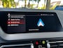 BMW 1-Serie 118i Business Edition M-Sport Automaat | M-AERODYNAMICA| STOF/LEDERENBEKLEDING| SFEERVERLICHTING| NAVIGATIE + APPLE CARPLAY/ANDROID AUTO| PARKEERSENSOREN V+A| LED KOPLAMPEN| SPORTSTOEL| DEALER ONDERHOUDEN| EERSTE EIGENAAR|