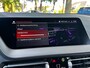 BMW 1-Serie 118i Business Edition M-Sport Automaat | M-AERODYNAMICA| STOF/LEDERENBEKLEDING| SFEERVERLICHTING| NAVIGATIE + APPLE CARPLAY/ANDROID AUTO| PARKEERSENSOREN V+A| LED KOPLAMPEN| SPORTSTOEL| DEALER ONDERHOUDEN| EERSTE EIGENAAR|