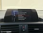 BMW 1-Serie 114i Sport High Executive Sportstoelen Trekhaak Climate
