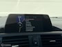 BMW 1-Serie 114i Sport High Executive Sportstoelen Trekhaak Climate