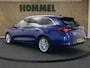 SEAT Leon Sportstourer 1.5 eTSI XCELLENCE - STOEL & STUUR VERWARMING - PARKEERSENSOREN VOOR EN ACHTER - HOMMEL ONDERHOUDEN - NAVIGATIE - DRAADLOZE TELEFOONLADER - ACHTERUITRIJ CAMERA - APPLE CARPLAY/ANDROID AUTO - KEYLESS ENRTY & START