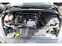 Ford Focus Wagon 1.0-125pk Titanium. Zeer nette, praktische en goed onderhouden wagen, afkomstig van de 1e eig. ! Autm. airco dual, cruise control, trekhaak, verwarmd voorraam, navigatie, telefoonvoorb., metallic lak, pdc v~a, LM wielen, All Season banden etc.