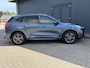 Ford Kuga 2.5 PHEV ST-Line X / Panorama schuifdak / 1.500 kg trekgewicht / Parkeer assistent / Navi / B&O audio / Apple Carplay Android / Stuur-, stoel- en achterbankverwarming / Elektr. stoel & klep / 18" LM wielen /