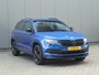 Skoda Karoq 1.5 TSI ACT 150pk DSG Sportline Business | Panorama dak | Zwenkbare trekhaak | Elektrische achterklep | Virtual Cockpit | Canton Audio