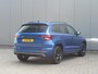 Skoda Karoq 1.5 TSI ACT 150pk DSG Sportline Business | Panorama dak | Zwenkbare trekhaak | Elektrische achterklep | Virtual Cockpit | Canton Audio