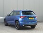 Skoda Karoq 1.5 TSI ACT 150pk DSG Sportline Business | Panorama dak | Zwenkbare trekhaak | Elektrische achterklep | Virtual Cockpit | Canton Audio