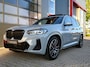 BMW X3 xDrive30e M-Sport Shadow Line | High Executive | Pano | Laser Led | H&K | Electric Seats Memory | Vernasca Leder | Adaptive Cruise | Camera | Trekhaak | Digital Dash | Keyless | Carplay | Head-Up | Ambilight | Dodehoek | 20'' | Lane Assist |