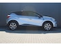 Renault Captur 1.6 E-Tech Hybrid 145 Intens | Incl. 12 Maanden garantie | Stuurverwarming | Adaptieve Cruise | Lane Assist | Airco | 360° Camera | Parkeersensoren | Apple Carplay/ Android Auto | Bluetooth | Parkeer Assistent | Navigatie | DAB |