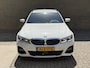 BMW 3-Serie Touring 320e M-pakket | 360 camera | Laser-LED | Sportstoelen | Leder/alcantara | Navigatie | Apple CarPlay | Head Up | 18 inch M-velgen | Stoelverwarming | Sfeerverlichting | Keyless | DAB | Elektrische achterklep | Volledig onderhouden