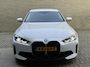 BMW i4 eDrive40 84 kWh | 93% SOH | Trekhaak elektrisch wegklapbaar | Sportstoelen | Half leder | Navigatie | Apple CarPlay | Stoelverwarming | 18 inch velgen | LED | DAB | Volledig onderhouden