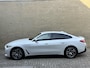 BMW i4 eDrive40 84 kWh | 93% SOH | Trekhaak elektrisch wegklapbaar | Sportstoelen | Half leder | Navigatie | Apple CarPlay | Stoelverwarming | 18 inch velgen | LED | DAB | Volledig onderhouden