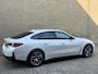 BMW i4 eDrive40 84 kWh | 93% SOH | Trekhaak elektrisch wegklapbaar | Sportstoelen | Half leder | Navigatie | Apple CarPlay | Stoelverwarming | 18 inch velgen | LED | DAB | Volledig onderhouden