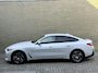BMW i4 eDrive40 84 kWh | 93% SOH | Trekhaak elektrisch wegklapbaar | Sportstoelen | Half leder | Navigatie | Apple CarPlay | Stoelverwarming | 18 inch velgen | LED | DAB | Volledig onderhouden