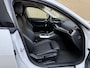 BMW i4 eDrive40 84 kWh | 93% SOH | Trekhaak elektrisch wegklapbaar | Sportstoelen | Half leder | Navigatie | Apple CarPlay | Stoelverwarming | 18 inch velgen | LED | DAB | Volledig onderhouden