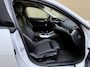 BMW i4 eDrive40 84 kWh | 93% SOH | Trekhaak elektrisch wegklapbaar | Sportstoelen | Half leder | Navigatie | Apple CarPlay | Stoelverwarming | 18 inch velgen | LED | DAB | Volledig onderhouden