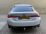 BMW i4 eDrive40 84 kWh | 93% SOH | Trekhaak elektrisch wegklapbaar | Sportstoelen | Half leder | Navigatie | Apple CarPlay | Stoelverwarming | 18 inch velgen | LED | DAB | Volledig onderhouden
