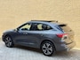 Ford Kuga 2.5 PHEV 224pk ST-Line X | 53.000km | Panoramadak | Camera voor&achter | Navigatie | 19 inch velgen | Adaptieve cruise | Lane assist | Dodehoekdetectie | Bang&Olufsen audio | Stoel&stuurverwarming | Verwarmde voorruit | Apple CarPlay | LED | DAB | Keyless | Elektrische achterklep | Volledig dealeronderhouden