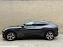 Ford Mustang Mach-E Extended Premium AWD 98 kWh | 94% SOH | Panoramadak | Trekhaak afneembaar | Lederen bekleding | 360 camera | Bang&Olufsen | 19 inch velgen | Adaptieve cruise | Elektrische achterklep | Dodehoekdetectie | LED | DAB | Keyless | Dealeronderhouden