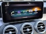 Mercedes-Benz C-klasse Estate 180 Business Solution AMG | Panoramadak | Trekhaak elektrisch wegklapbaar | Distronic | Camera | Sportstoelen | Lederen bekleding | Stoelverwarming | Navigatie | Apple CarPlay | 19 inch velgen | Sfeerverlichting | Elektrische achterklep | LED | Volledig dealeronderhouden