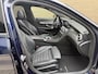 Mercedes-Benz C-klasse Estate 180 Business Solution AMG | Panoramadak | Trekhaak elektrisch wegklapbaar | Distronic | Camera | Sportstoelen | Lederen bekleding | Stoelverwarming | Navigatie | Apple CarPlay | 19 inch velgen | Sfeerverlichting | Elektrische achterklep | LED | Volledig dealeronderhouden