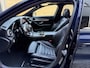 Mercedes-Benz C-klasse Estate 180 Business Solution AMG | Panoramadak | Trekhaak elektrisch wegklapbaar | Distronic | Camera | Sportstoelen | Lederen bekleding | Stoelverwarming | Navigatie | Apple CarPlay | 19 inch velgen | Sfeerverlichting | Elektrische achterklep | LED | Volledig dealeronderhouden