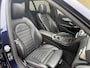 Mercedes-Benz C-klasse Estate 180 Business Solution AMG | Panoramadak | Trekhaak elektrisch wegklapbaar | Distronic | Camera | Sportstoelen | Lederen bekleding | Stoelverwarming | Navigatie | Apple CarPlay | 19 inch velgen | Sfeerverlichting | Elektrische achterklep | LED | Volledig dealeronderhouden