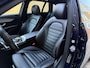 Mercedes-Benz C-klasse Estate 180 Business Solution AMG | Panoramadak | Trekhaak elektrisch wegklapbaar | Distronic | Camera | Sportstoelen | Lederen bekleding | Stoelverwarming | Navigatie | Apple CarPlay | 19 inch velgen | Sfeerverlichting | Elektrische achterklep | LED | Volledig dealeronderhouden