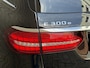 Mercedes-Benz E-klasse Estate 300 e 320pk Avantgarde AMG Line | Elektrisch wegklapbare trekhaak | Schuif/kanteldak | 360 camera | Widescreen | Sfeerverlichting | Apple CarPlay | Stoelverwarming | Elektrische achterklep | Volledig onderhouden