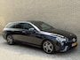 Mercedes-Benz E-klasse Estate 300 e 320pk Avantgarde AMG Line | Elektrisch wegklapbare trekhaak | Schuif/kanteldak | 360 camera | Widescreen | Sfeerverlichting | Apple CarPlay | Stoelverwarming | Elektrische achterklep | Volledig onderhouden