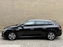 Renault Megane E-Tech 1.6 Plug-In Hybrid 160 Intens | Leder | Camera | Trekhaak afneembaar | Adaptieve cruise | Stoelverwarming | Navigatie | Dodehoekdetectie | Head up | Apple CarPlay / Android Auto | Keyless | LED | DAB | Volledig onderhouden